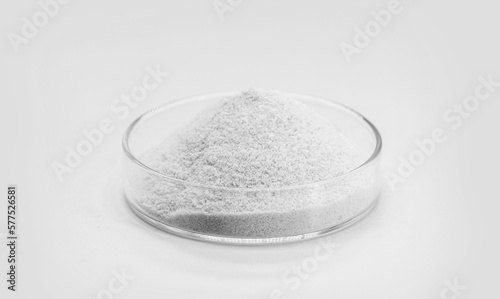 lactase enzyme, food supplement, powder containing the enzyme lactase. · The enzyme lactase helps to digest the lactose present in food. isolated white background