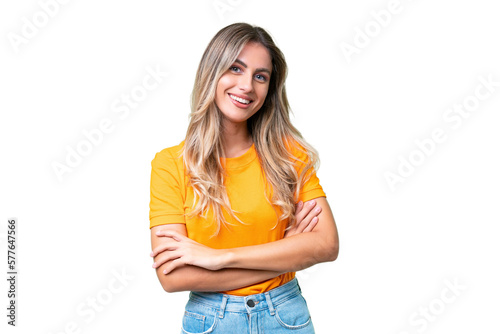 Young Uruguayan woman over isolated background keeping the arms crossed in frontal position