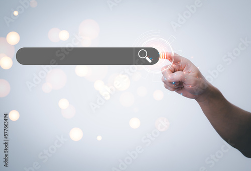 Information search technology, search engine optimization, male hand using a smartphone to search information, using search bar function on your website