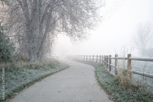 northern Colorado bike trail in fog - November morning on the Poudre River Trail near WIndsor