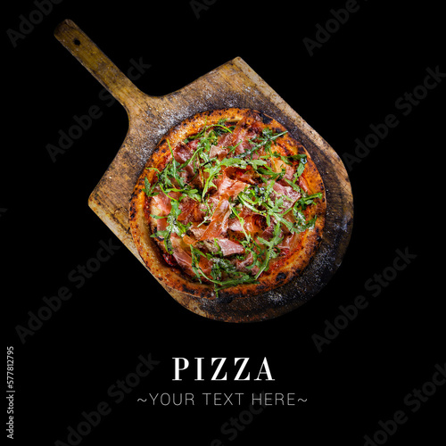 Above of classic Italian uncut Parma ham pizza with tomatoes, mozzarella cheese and fresh arugula leaves served on baking shovel. Cheesy pizza isolated on black background with text and copy space