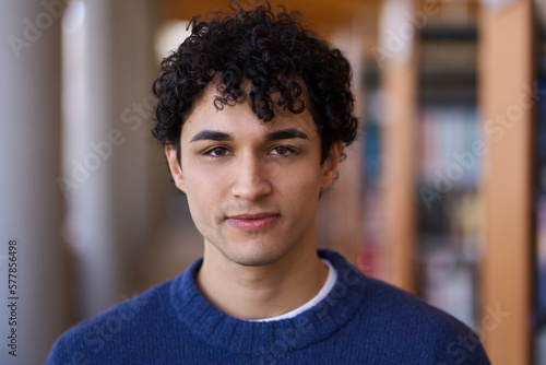 Portrait of a handsome 20 years old young Latin American man confidently looking at camera