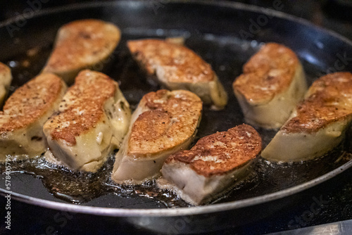 Cooking foie gras over pan
