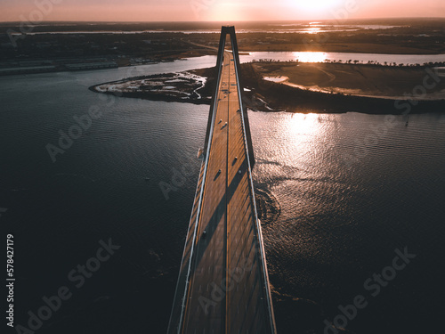Aerial view of the Arthur Ravenel Jr. Bridge during sunrise.