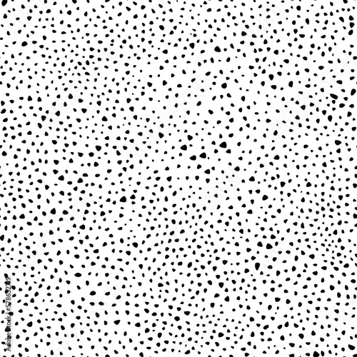 Seamless pattern in polka dot style. Black and white doodle print. Vector illustration.