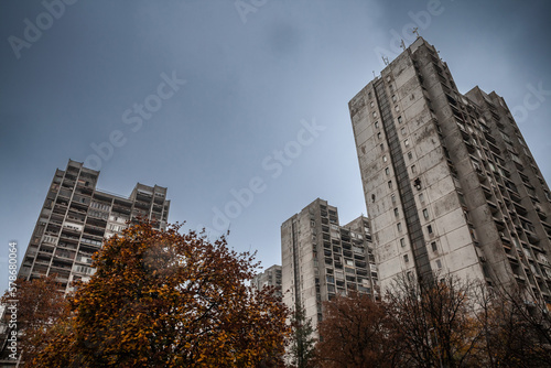 Selective blur on a High rise building from Novi Beograd, in Belgrade, Serbia, a traditional communist housing ensemble with a brutalist style, with a moving sky effect in background.