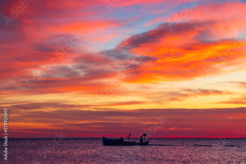 Fishing Boat and sea sunrise