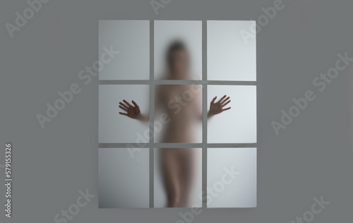 Blur naked body. Diffuse sexy woman silhouette. Blurred sexy woman body shape. Beautiful naked woman body silhouette, slim breast. Sexy woman poses boobs, tits behind the window.