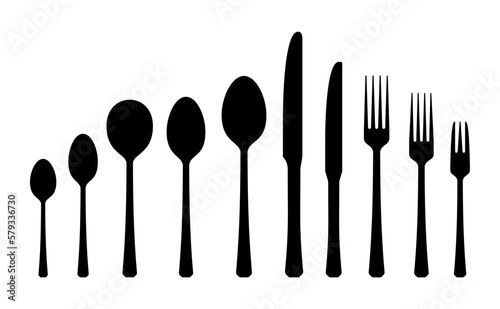 The dishes in the vector are isolated on a white background. Spoon fork knife plate hand-drawn. Table setting. The cutlery is black and white. Kitchen tools. Time to cook