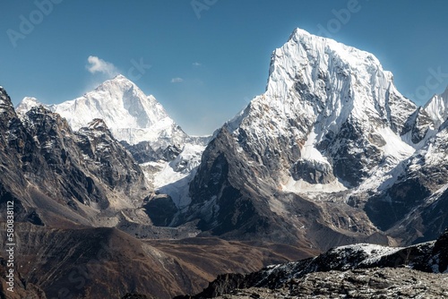 Snow covered peaks of Cholatse and Makalu in the background. Beautiful view from Renjo-La, while descending to Gokyo