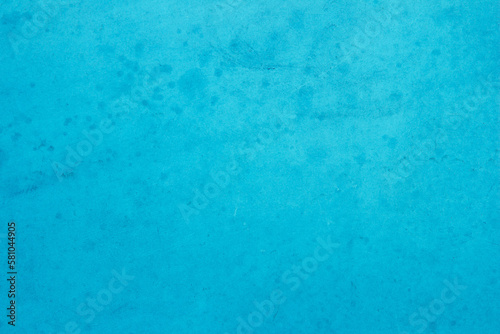 Blue dark concrete texture for background in summer wallpaper. Cement colour and sand wall of tone vintage. Abstract teal dark color. 