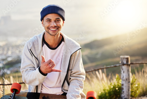 Smile, portrait of skateboarder with shaka hand gesture and skateboarding hobby and skill on mountain. Freedom, fun and face of cool happy gen z man with happiness, longboard or skateboard and sports