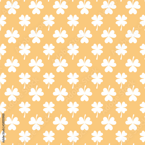 Beige seamless pattern with white clover leaves
