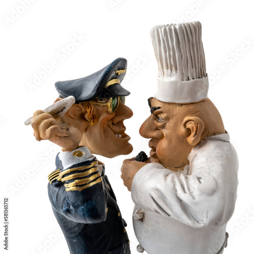 statuettes représentant un aviateur et un chef cuisinier face à face sur un fond transparent