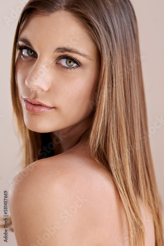 Beguiling beauty. Studio portrait of an attractive model gazing at the camera.