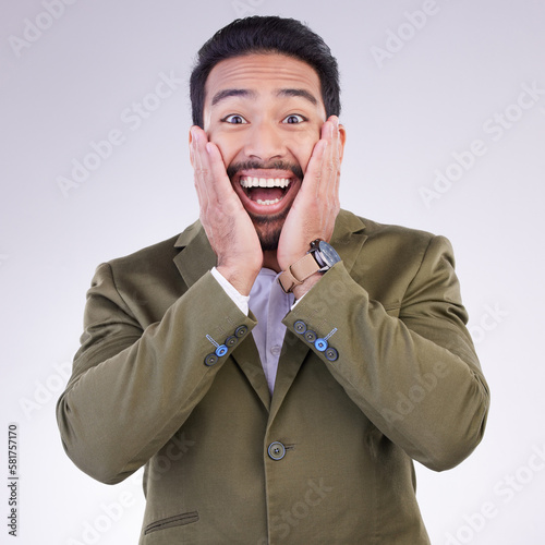 Happy, surprise and portrait of a businessman in a studio with wow, omg or wtf face expression. Happiness, excited and corporate male model from India with a shock facial gesture by a gray background