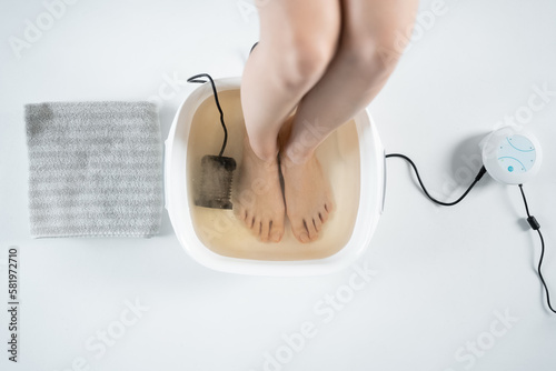 procedure of ionic detox foot bath machine in spa beauty center isolated