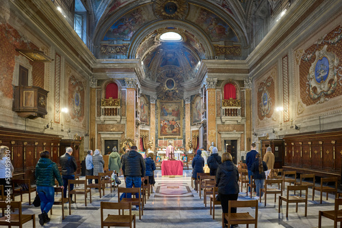 Mass at Oratorio di San Francesco Saverio (oratorio del Caravita) baroque styled church in the Pigna district of Rome, Italy 