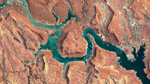 Colorado River, Lake Powell and Trachyte Canyon looking down aerial view from above – Bird’s eye view Colorado River, Utah, USA 