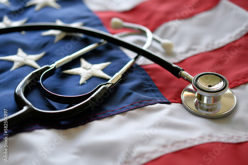 United States America healthcare medical concept - stethoscope on American flag