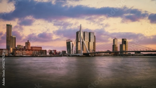 Scenic view of the city of Rotterdam and the Erasmusbrug bridge seen during the sunset