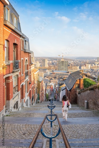 Scenic view of a female walking down the Montagne de Bueren stairway in Liege, Belgium