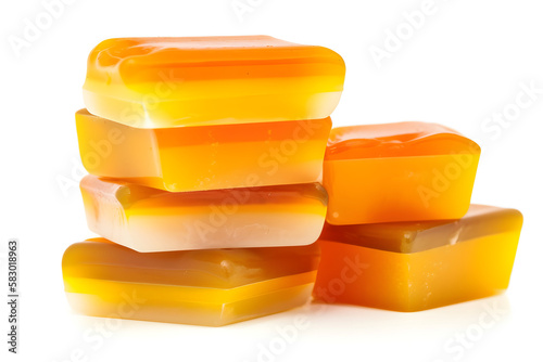 pile of glycerine soaps, orange and yellow, on a white background. Generative Ai