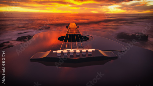 acoustic guitar on sandy beach