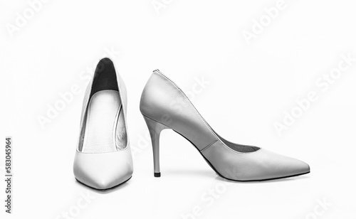 Stylish classic women leather shoe. Fashionable women shoes isolated on white background. White high heel women shoes on white background