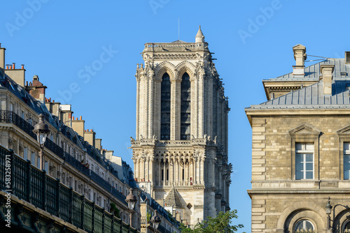The Pont dArcole and Notre Dame de Paris cathedral , in Europe, France, Ile de France, Paris, Along the Seine, in summer, on a sunny day.