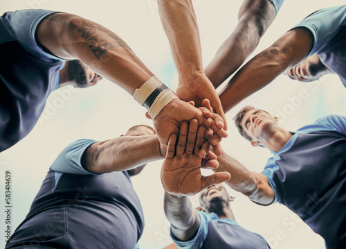 Diversity, team and men with hands together in sports below for support, motivation or goals outdoors. Man sport group piling hand for fitness, teamwork or success in collaboration for match or game