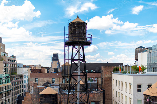 Iconic water tower on top of office building in New York City