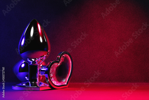 Black butt anal plugs sex toys on neon lights. 3D illustration. Empty space for your text