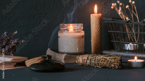 Tarot, astrology,Esoteric, Occult mystical ritual scene of sorcery tarot candles,dried flowers, palo santo tarot cards, ritual book.Witchcraft,mysticism and occultism,esoteric background,tarot banner