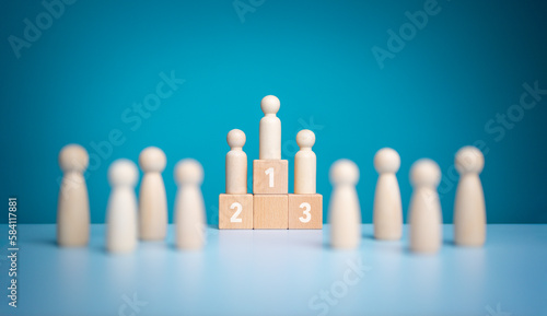 Business hierarchy, Wooden figures peg dolls standing on the podium 1st, 2nd, and 3rd positions of wooden cube blocks with copy space. Ranking and strategy concept. Success or ranking ideas.