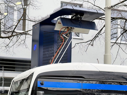26.02.2023 Gdynia, Trojmiasto, Poland, Europe. Close-up of a pantograph charging electric public transport bus