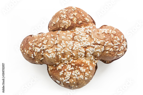 Close up on a colomba, traditional italian easter dessert, isolated on white.