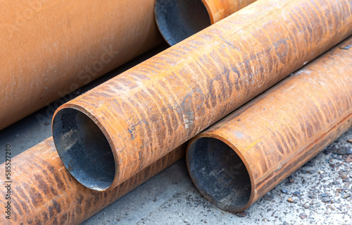 Metal pipes covered with rust at the construction site