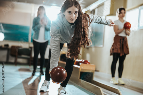 Young Woman Playing Bowling Nine Pin