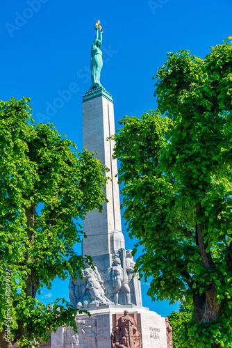 View of the Freedom monument from the Bastelkajna park in Riga, Latvia.