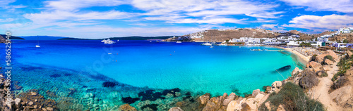 Greece summer holidays. Cyclades .Most famous and beautiful beaches of Mykonos island -Platis Gialos with crystal clear waters