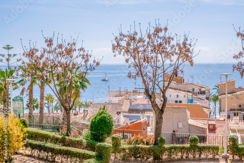 Panorama of picturesque Villajoyosa village with narrow cozy streets, small park and Mediterranean sea. Alicante province, Costa Blanca,Spain