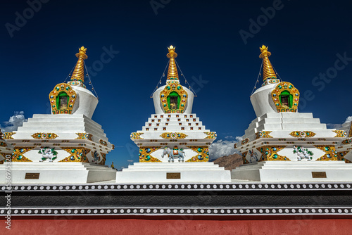 White chortens (Buddhist stupas) in Thiksey gompa. Ladakh, Jammu and Kashmir, India