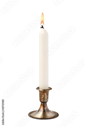 White candle in an antique silver candleholder isolated cutout on transparent