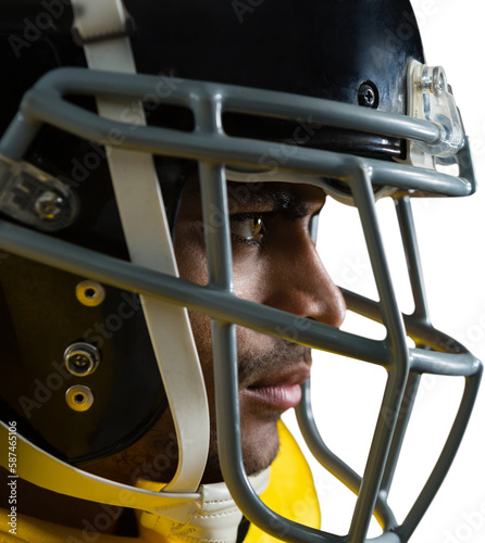 Close up of confident American football player wearing helmet