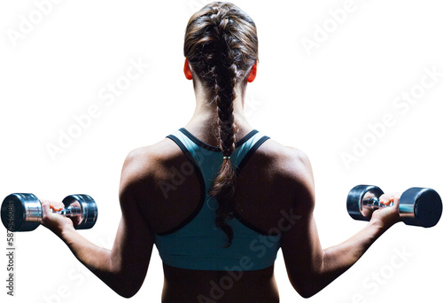 Rear view of braided hair woman lifting dumbbells