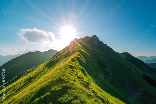 Beautiful sunrise over the green mountains in morning light with fluffy clouds on a bright blue sky. Nature freshness concept