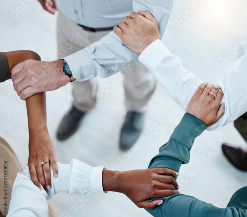 Teamwork, collaboration and hands of business people in shape for motivation, support and community. Diversity, team building and top view of arms in pentagon for goals, trust and mission in office