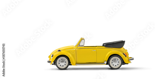 Model of yellow retro toy car cabriolet on white background. Miniature car side view with copy space