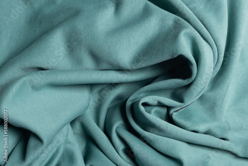 Top view green fleece fabric with creases